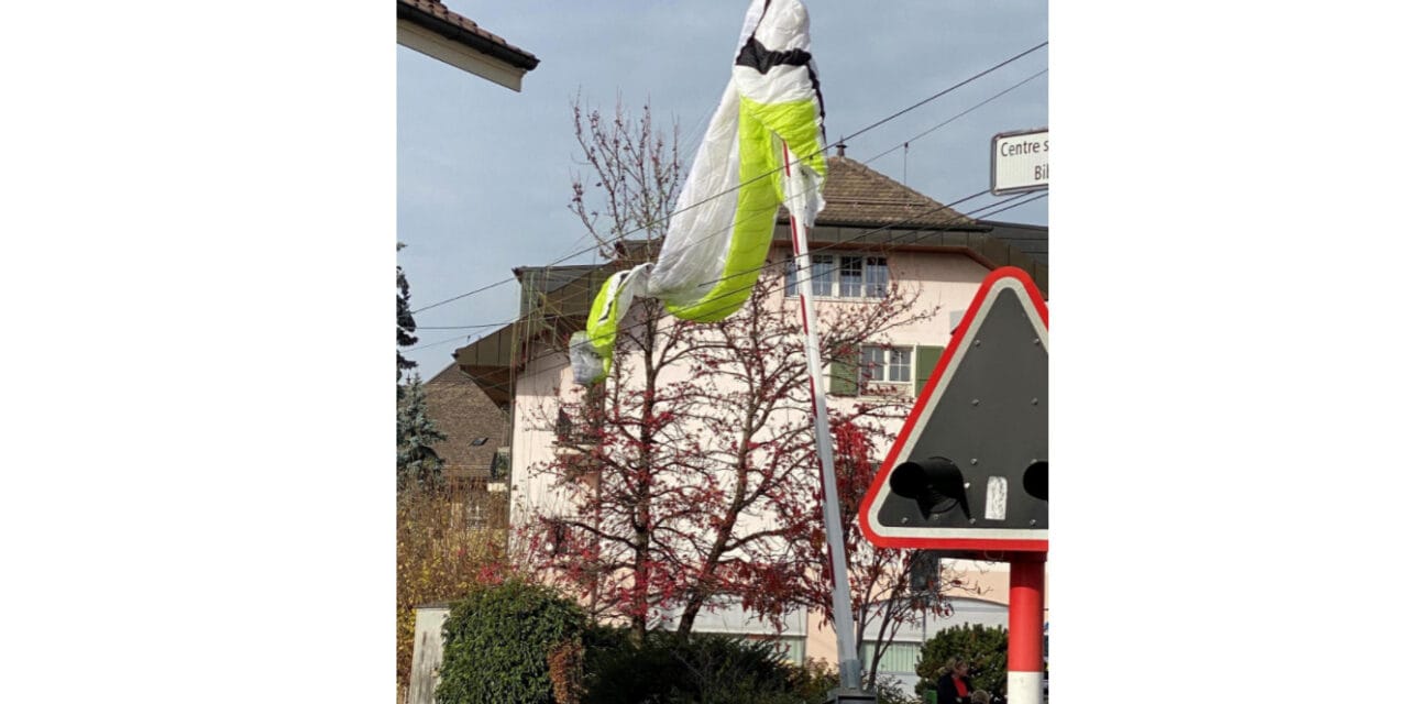 Praticante de parapente fica preso em cabos elétricos